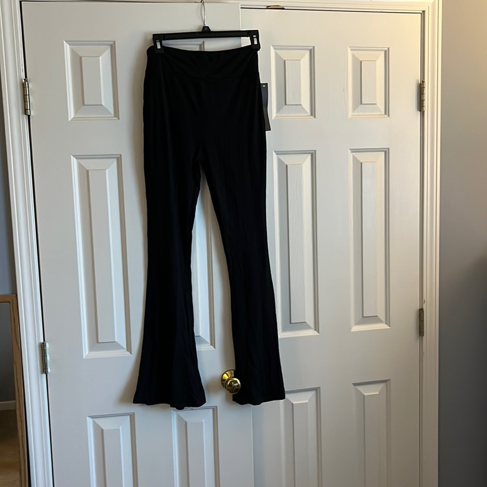 Brand new Black flare leggings, size M, with tags on, never worn